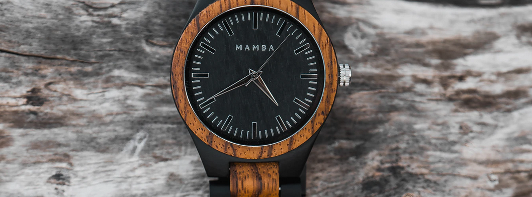 a wooden watch on a surface