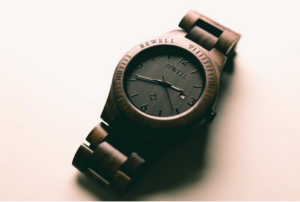 a wooden watch has a unique style